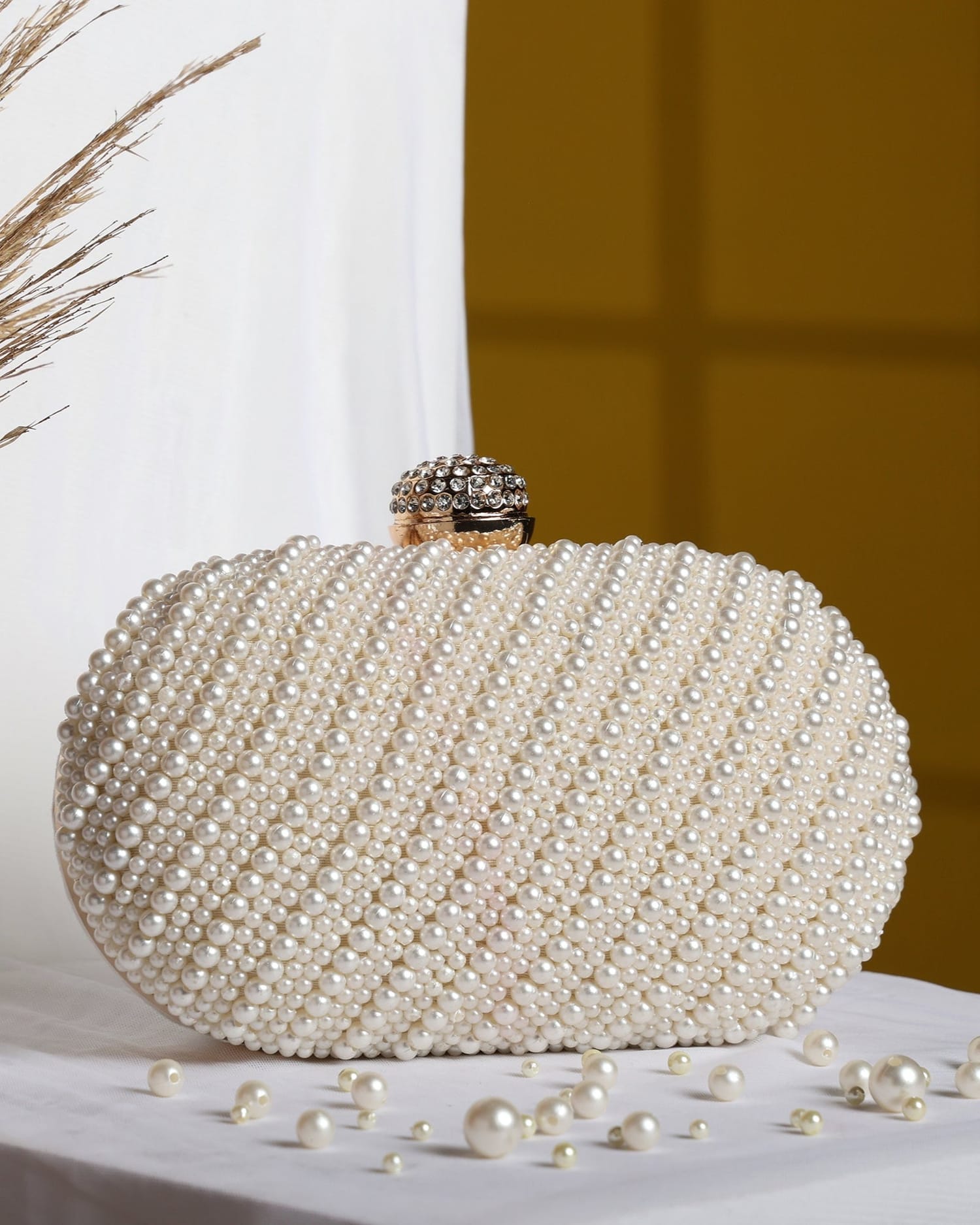 Bloom Oval Clutch