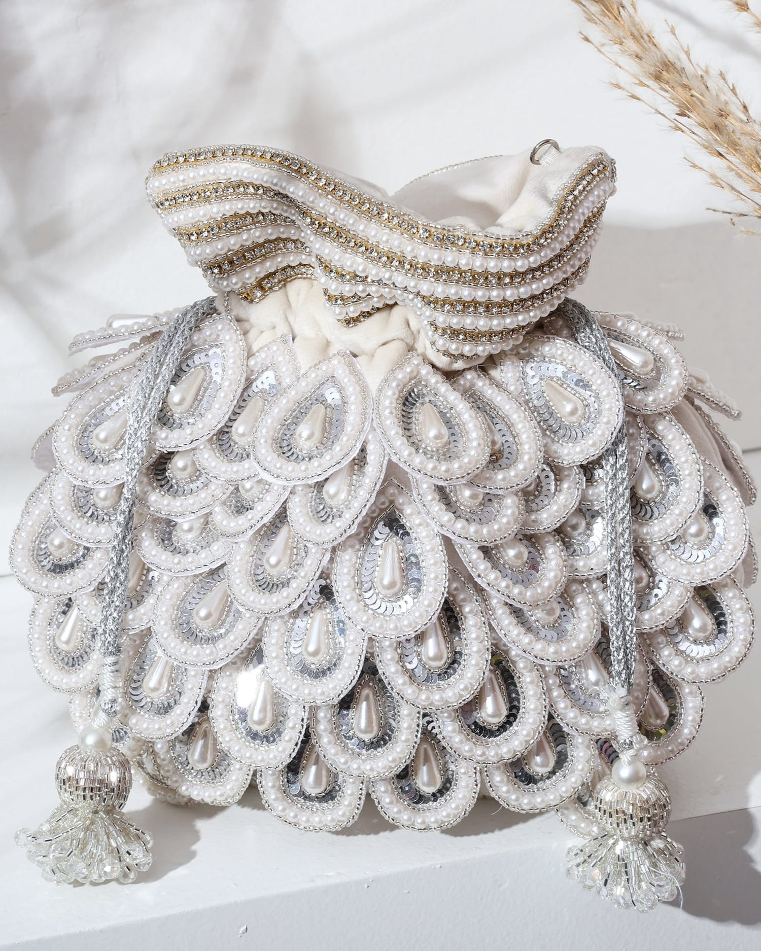 Designer festive potli bag with pearls, White pearl potli bag handcrafted for weddings, Bridal potli with pearl detailing, Handmade royal white potli bag India