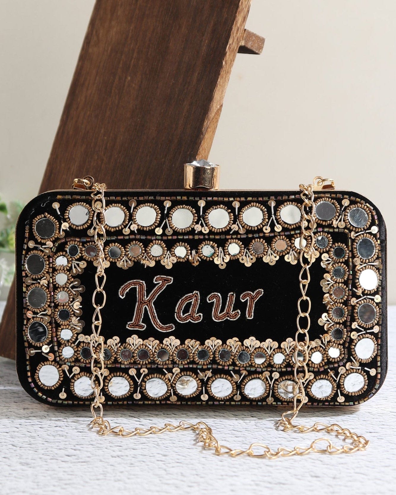 Kaur Name Clutch